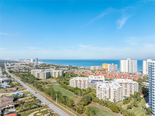 bird's eye view featuring a water view and a city view