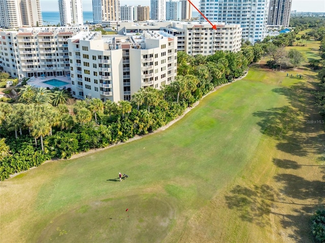 birds eye view of property featuring a view of city