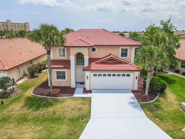 8 San Miguel Ct, Palm Coast, FL 32137 - mediterranean / spanish home with concrete driveway, stucco siding, a tile roof, and a front lawn