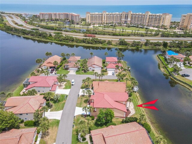 8 San Miguel Ct, Palm Coast, FL 32137 - aerial perspective of suburban area with a nearby body of water