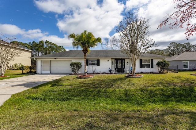 ranch-style home featuring a garage, concrete driveway, and a front lawn