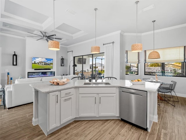 kitchen with a kitchen island with sink, visible vents, white cabinets, open floor plan, and dishwasher