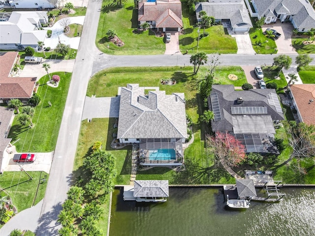 aerial view featuring a residential view and a water view