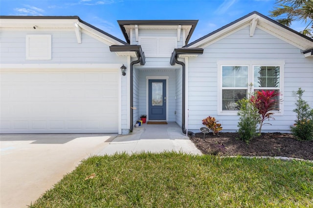 property entrance with a garage