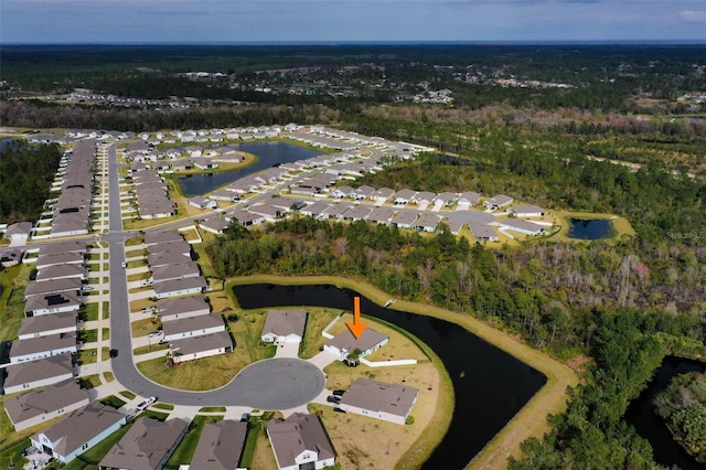 aerial view with a water view and a residential view