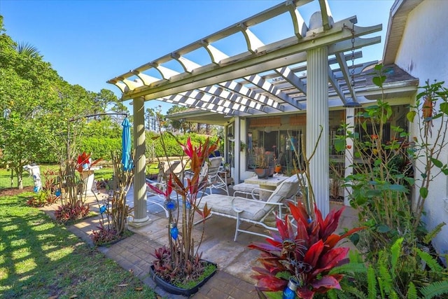 view of patio featuring a pergola