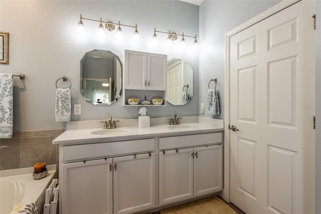 full bath with a washtub, a sink, and double vanity