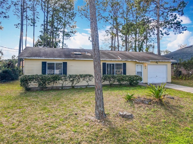 ranch-style house with a garage, driveway, and a front lawn