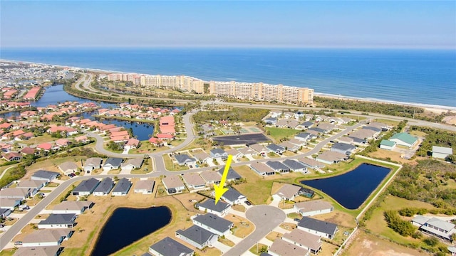 aerial view with a water view and a residential view