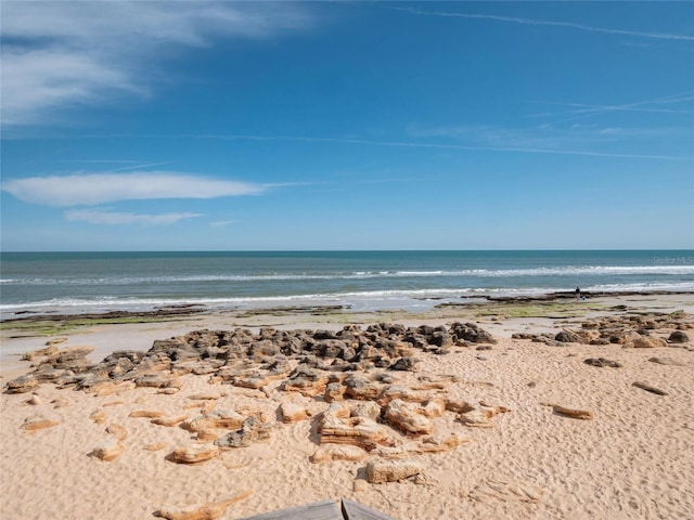 property view of water featuring a beach view