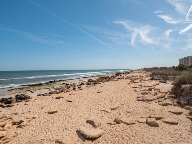 view of water feature featuring a beach view