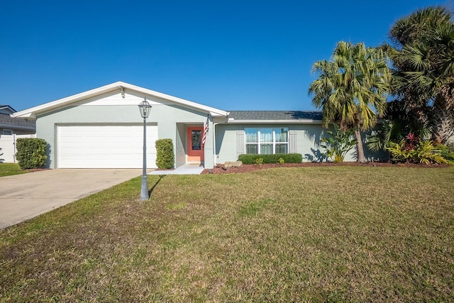 ranch-style home featuring an attached garage, a front yard, and stucco siding