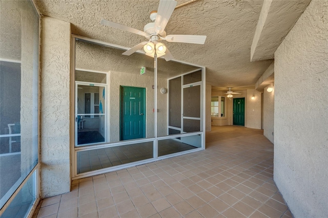 view of patio / terrace featuring ceiling fan