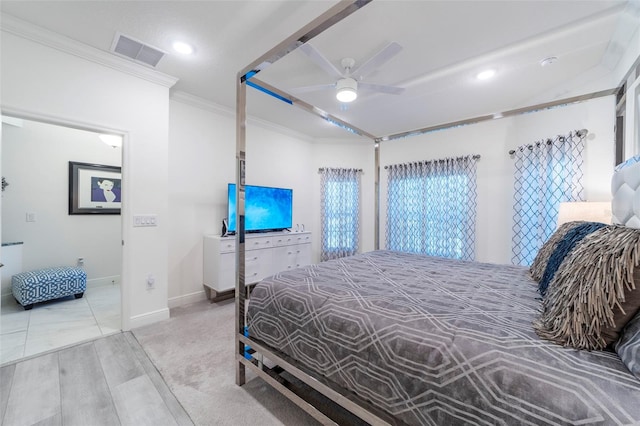 bedroom featuring baseboards, visible vents, a ceiling fan, wood finished floors, and crown molding