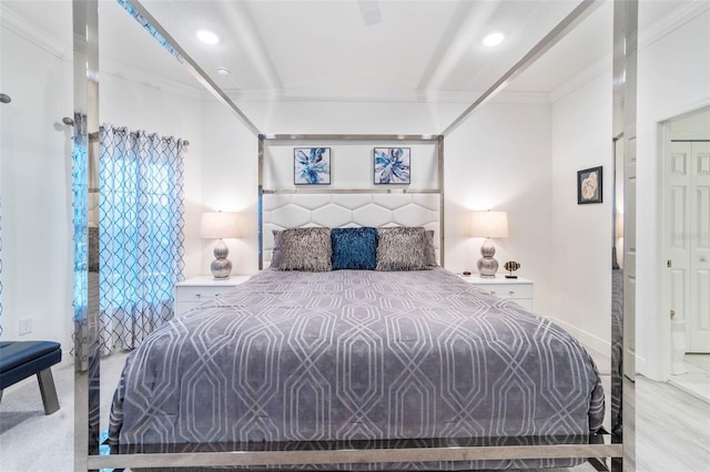 bedroom featuring ornamental molding and recessed lighting