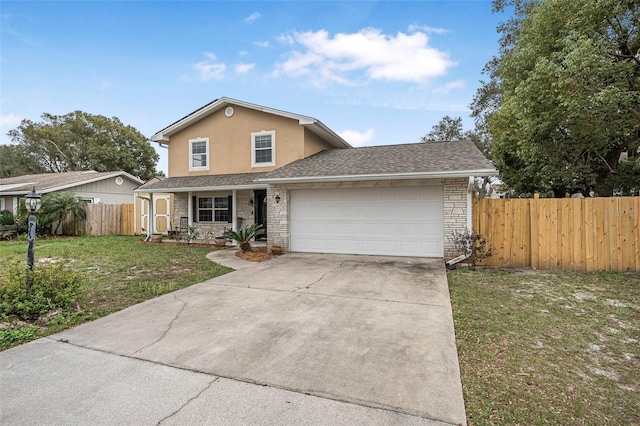 traditional home with concrete driveway, stone siding, an attached garage, fence, and a front lawn