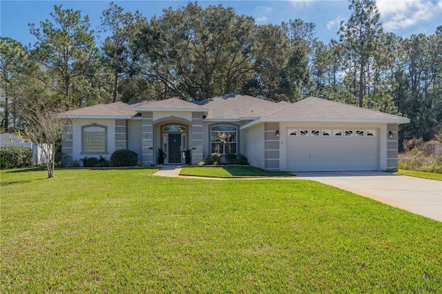 single story home featuring a garage, driveway, a front yard, and stucco siding