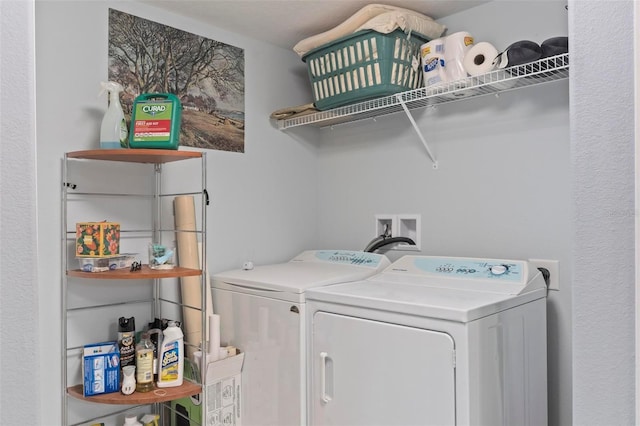 laundry room featuring laundry area and washer and clothes dryer