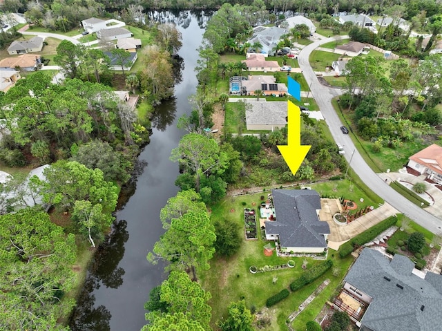 aerial view featuring a water view and a residential view