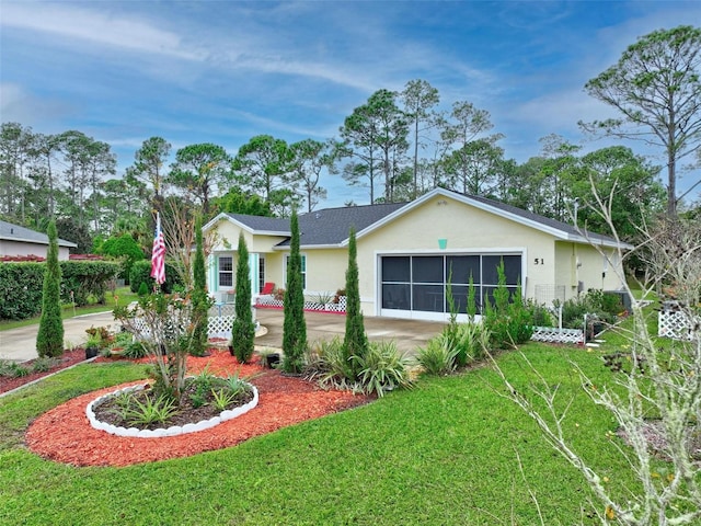 ranch-style home featuring an attached garage, driveway, a front lawn, and stucco siding