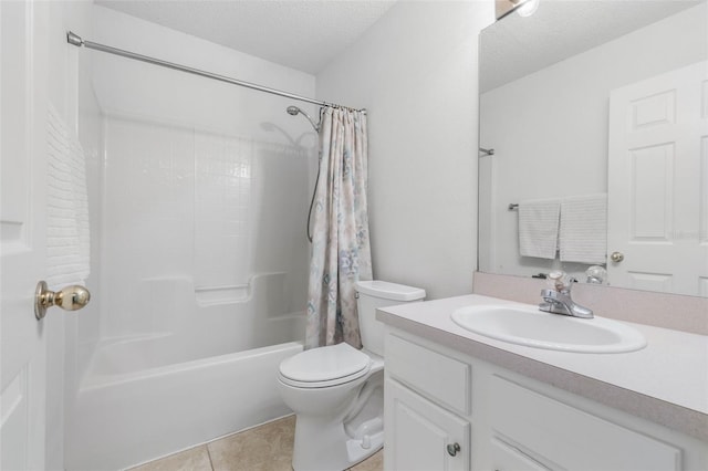 bathroom with shower / tub combo with curtain, toilet, a textured ceiling, vanity, and tile patterned flooring