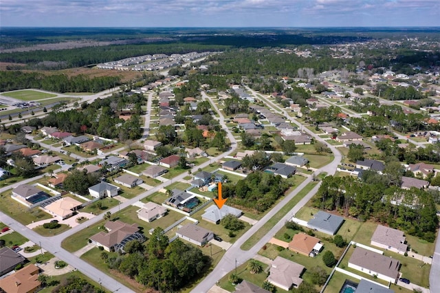 drone / aerial view with a residential view