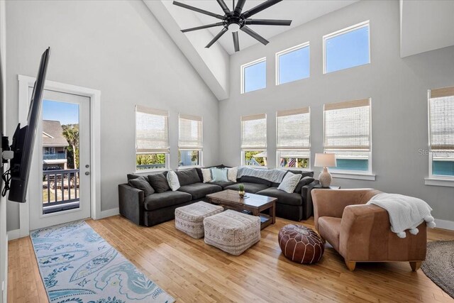 2737 John Bull, Flagler Beach, FL 32136 - living area with a healthy amount of sunlight, ceiling fan, baseboards, and wood finished floors