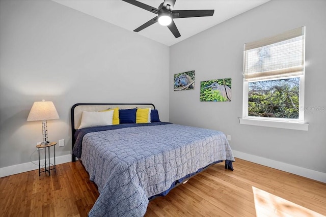 2737 John Bull, Flagler Beach, FL 32136 - bedroom featuring ceiling fan, baseboards, and wood finished floors