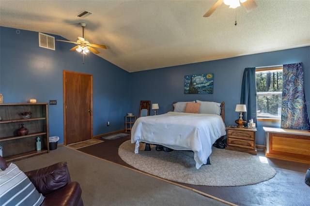 bedroom featuring visible vents, vaulted ceiling, a ceiling fan, and dark colored carpet