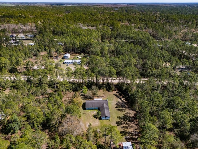 aerial view featuring a forest view