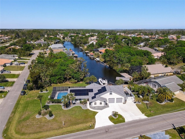 aerial view featuring a water view and a residential view