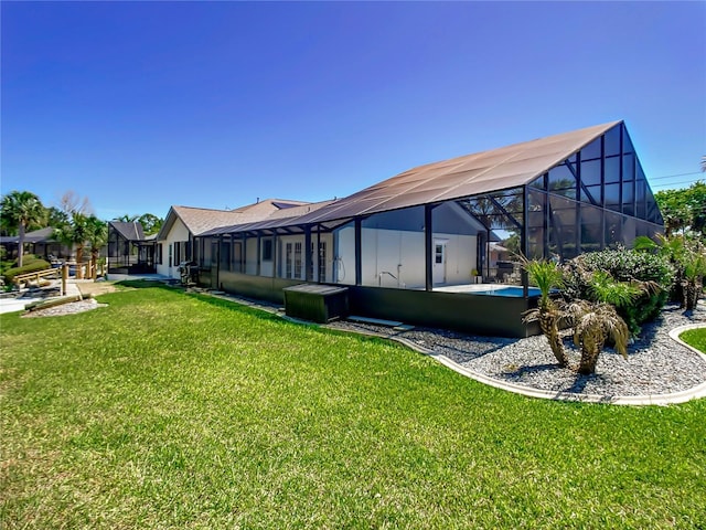 view of yard featuring a lanai and an outdoor pool