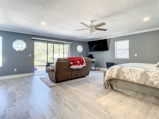 bedroom with access to outside, ornamental molding, ceiling fan, light wood-type flooring, and baseboards