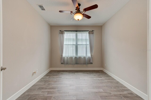 1068 Sea Shell Ct, Daytona Beach, FL 32124 - spare room with light wood-type flooring, visible vents, and baseboards