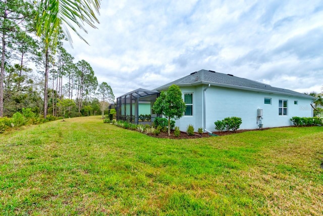 1068 Sea Shell Ct, Daytona Beach, FL 32124 - view of home's exterior featuring a lawn and a lanai