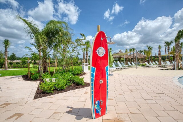 1068 Sea Shell Ct, Daytona Beach, FL 32124 - surrounding community featuring a patio