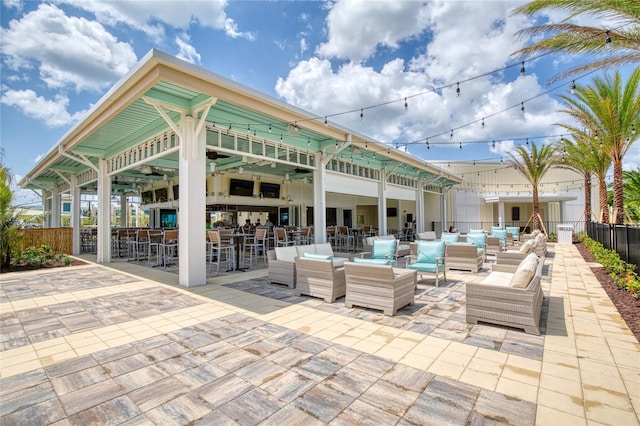 1068 Sea Shell Ct, Daytona Beach, FL 32124 - view of patio featuring outdoor dry bar, outdoor lounge area, and fence