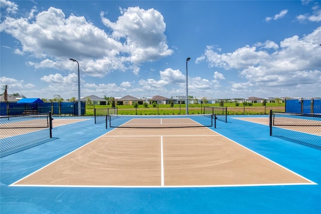 1068 Sea Shell Ct, Daytona Beach, FL 32124 - view of sport court with fence