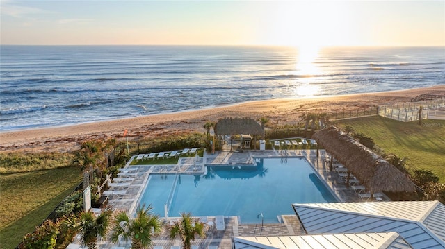 1068 Sea Shell Ct, Daytona Beach, FL 32124 - aerial view at dusk with a water view and a view of the beach