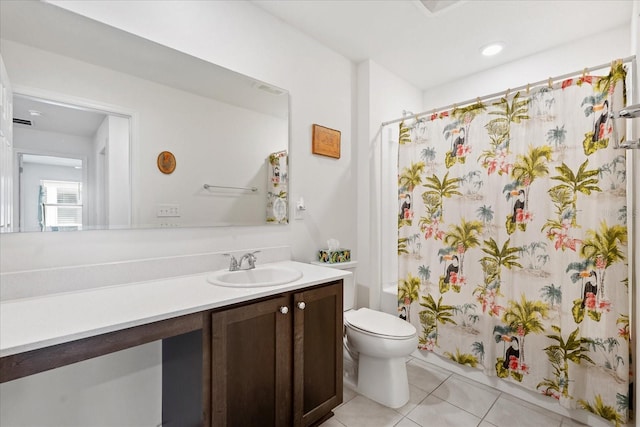 bathroom featuring toilet, tile patterned flooring, shower / bath combination with curtain, and vanity