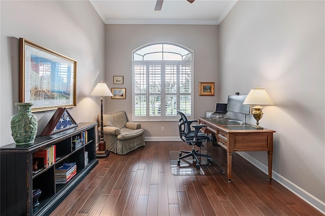 office with dark wood-type flooring, crown molding, baseboards, and a ceiling fan