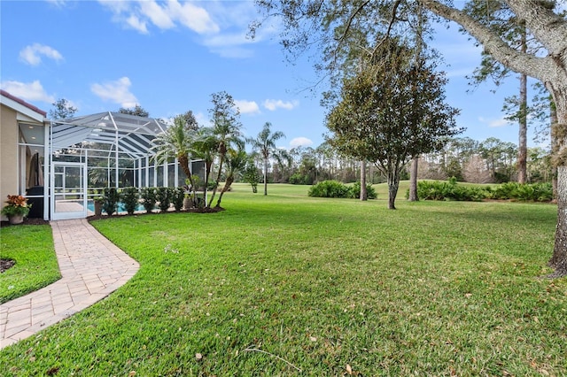 view of yard featuring a lanai