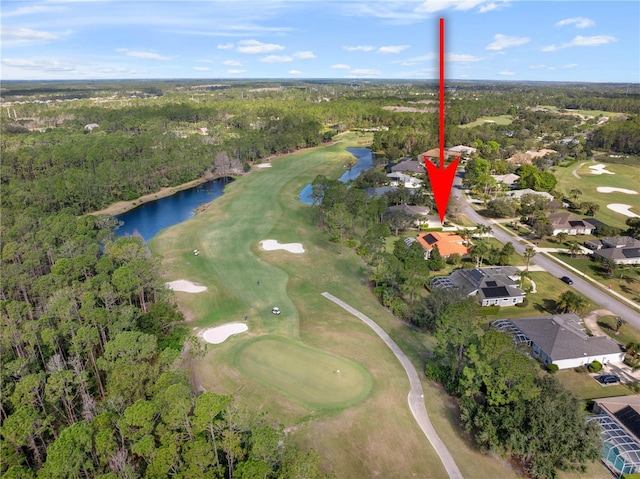 bird's eye view featuring a water view and golf course view