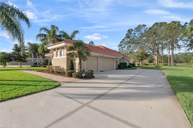 view of home's exterior with a garage, stucco siding, concrete driveway, and a yard