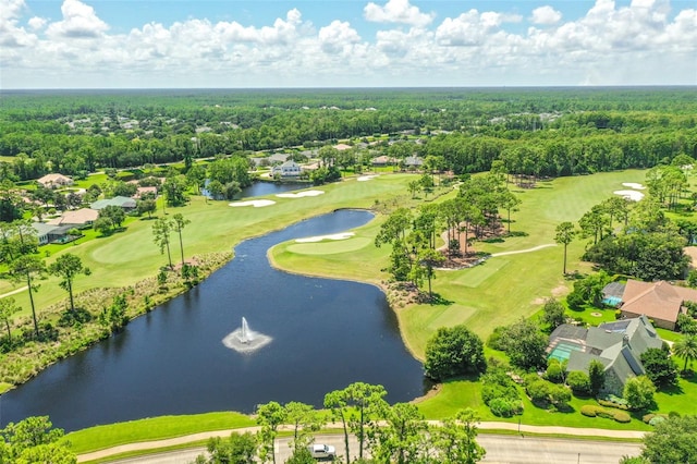 bird's eye view with a water view, a view of trees, and golf course view