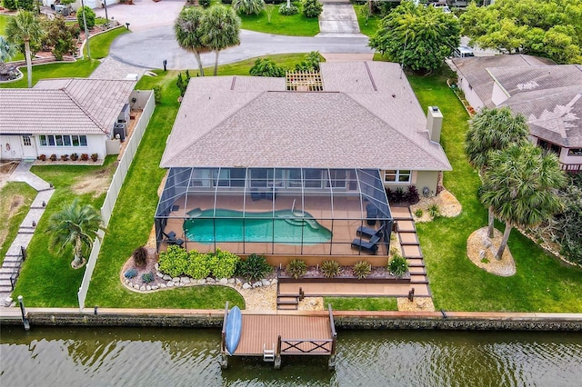 drone / aerial view with a water view