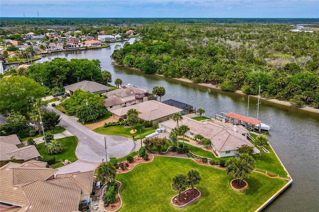 birds eye view of property featuring a water view and a residential view