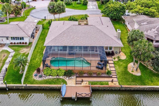 85 Comanche Ct, Palm Coast, FL 32137 - aerial view of property and surrounding area featuring a large body of water and a pool area