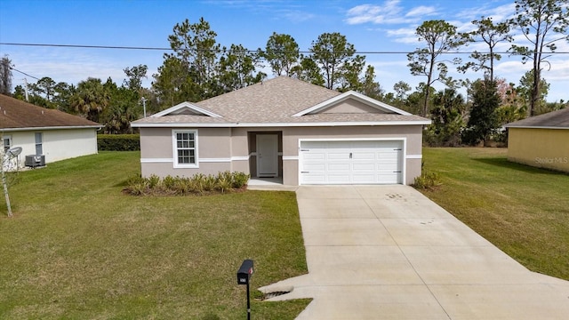 ranch-style house featuring a garage, a front yard, driveway, and stucco siding