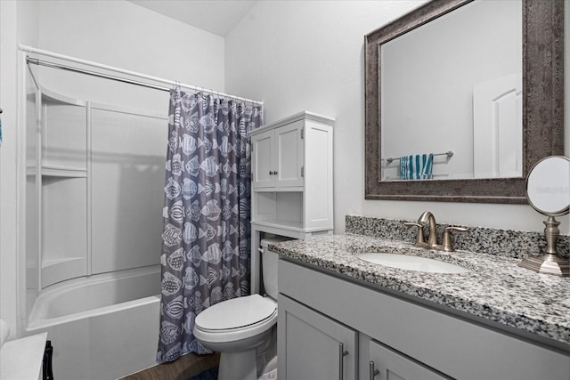 full bathroom with toilet, shower / tub combo, and vanity